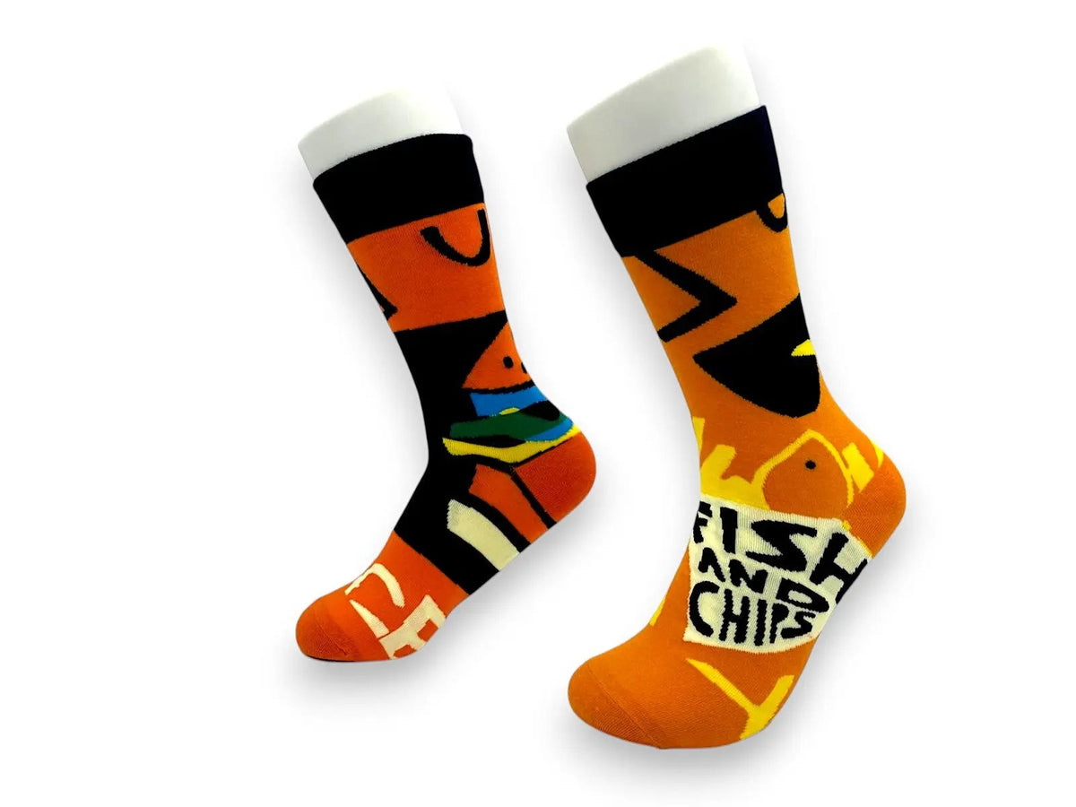 Side view of mismatched orange fish-and-chips socks with burger graphic