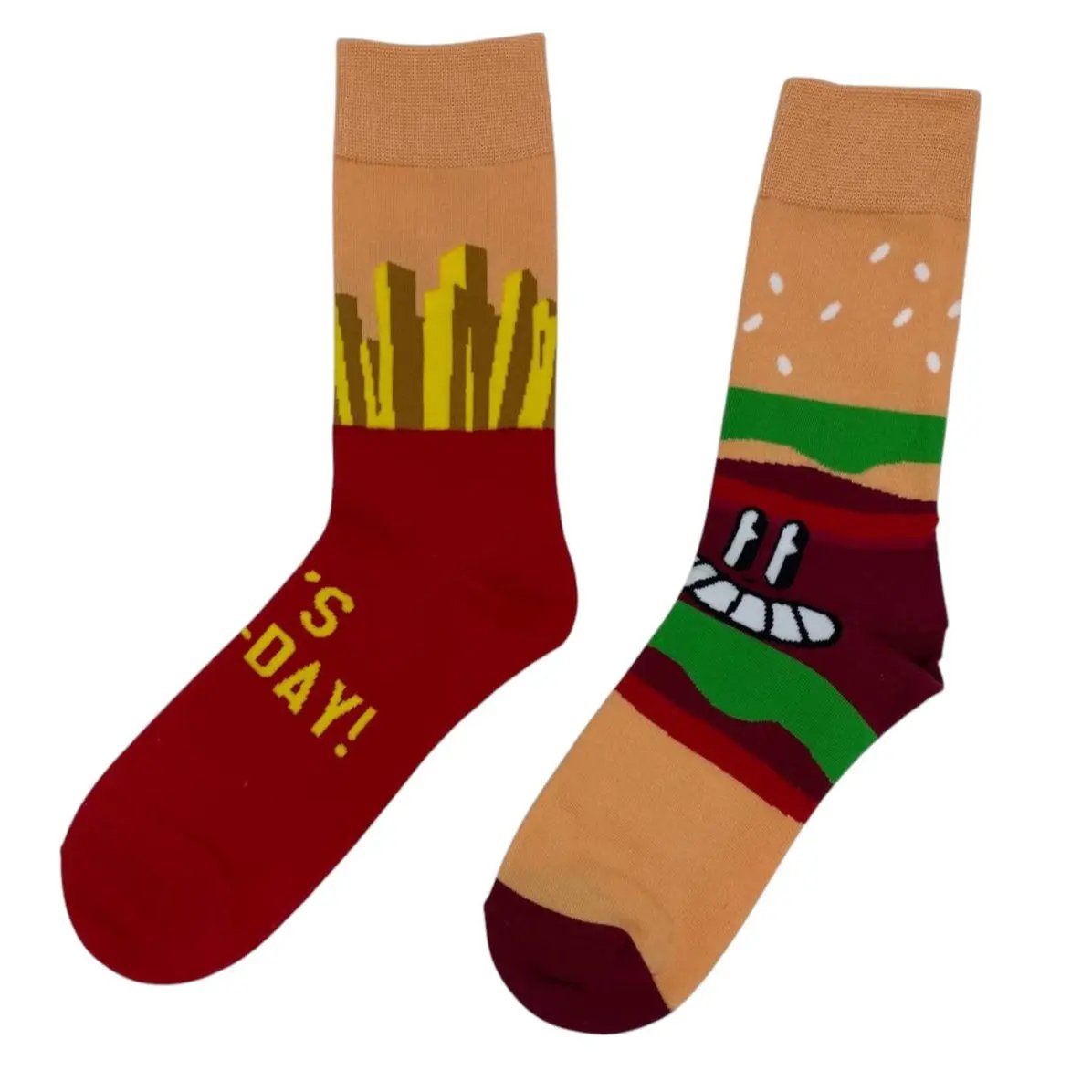 Flat lay of mismatched burger and fries novelty socks on white
