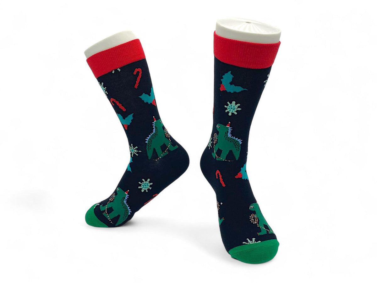 Navy Christmas crew socks with godzilla in Santa hats tangled in yellow lights