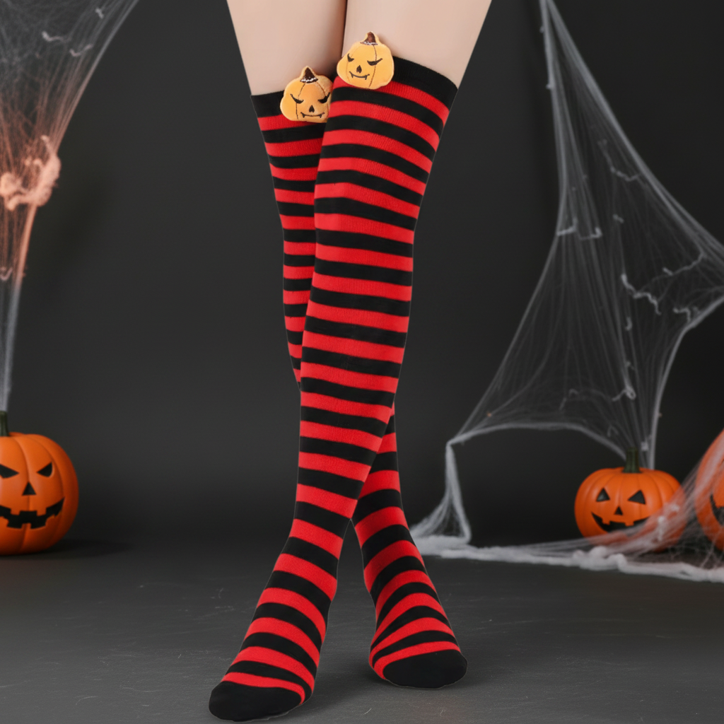 Red-and-black striped knee-high socks with pumpkin faces at the cuff