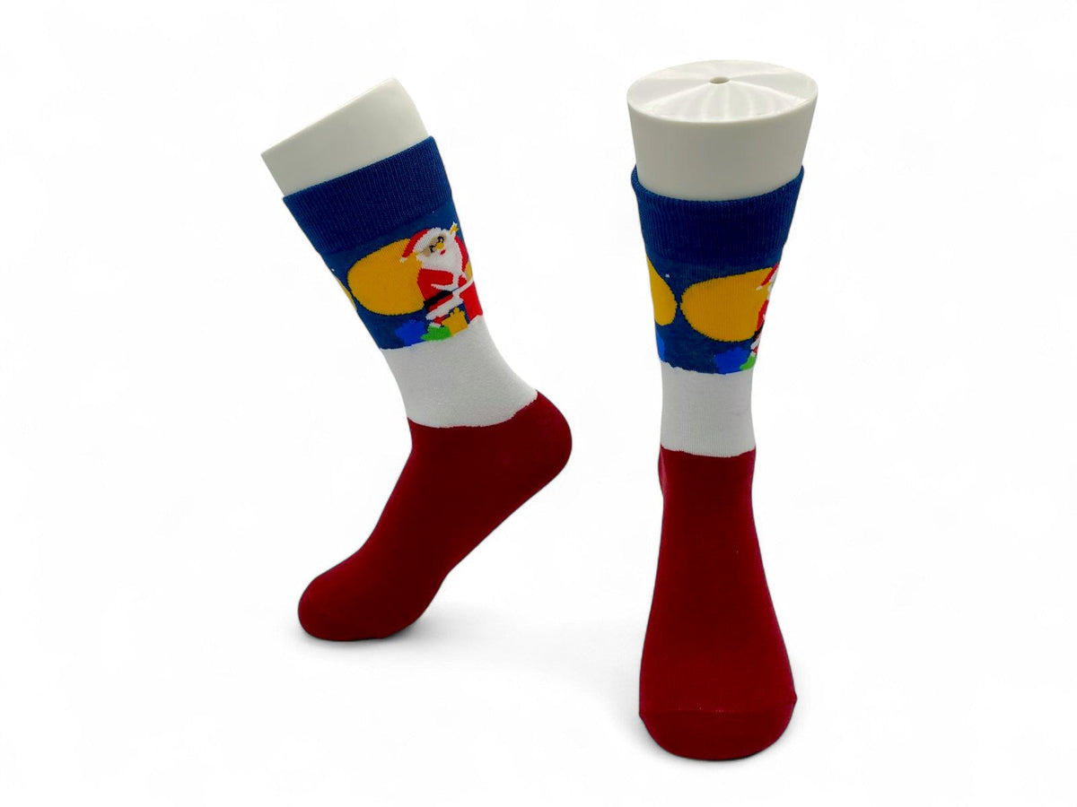 Christmas socks with Santa carrying a yellow sack on a blue band and a solid red foot