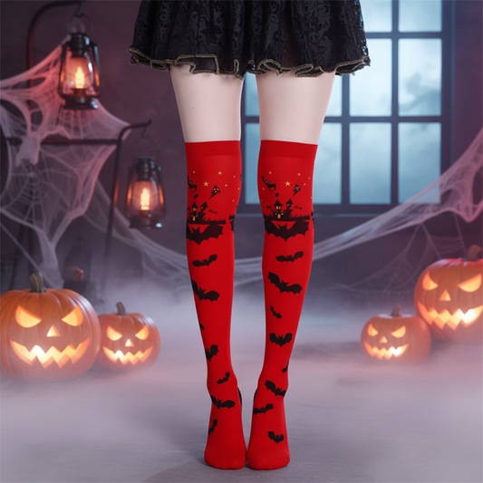 Red knee-high socks with bats, ghosts and a dark mansion