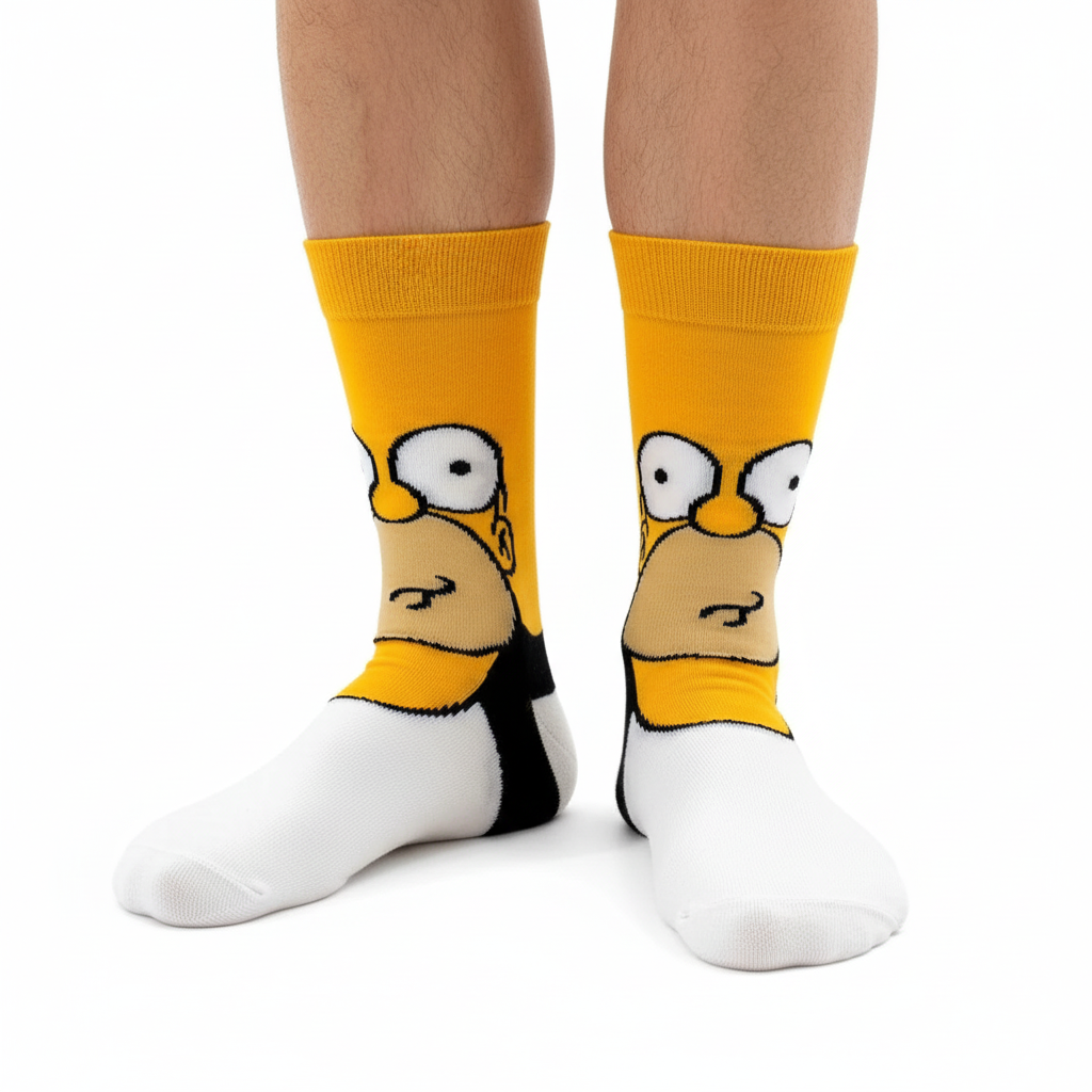 Close-up of male feet wearing Homer Simpson socks with yellow cuff