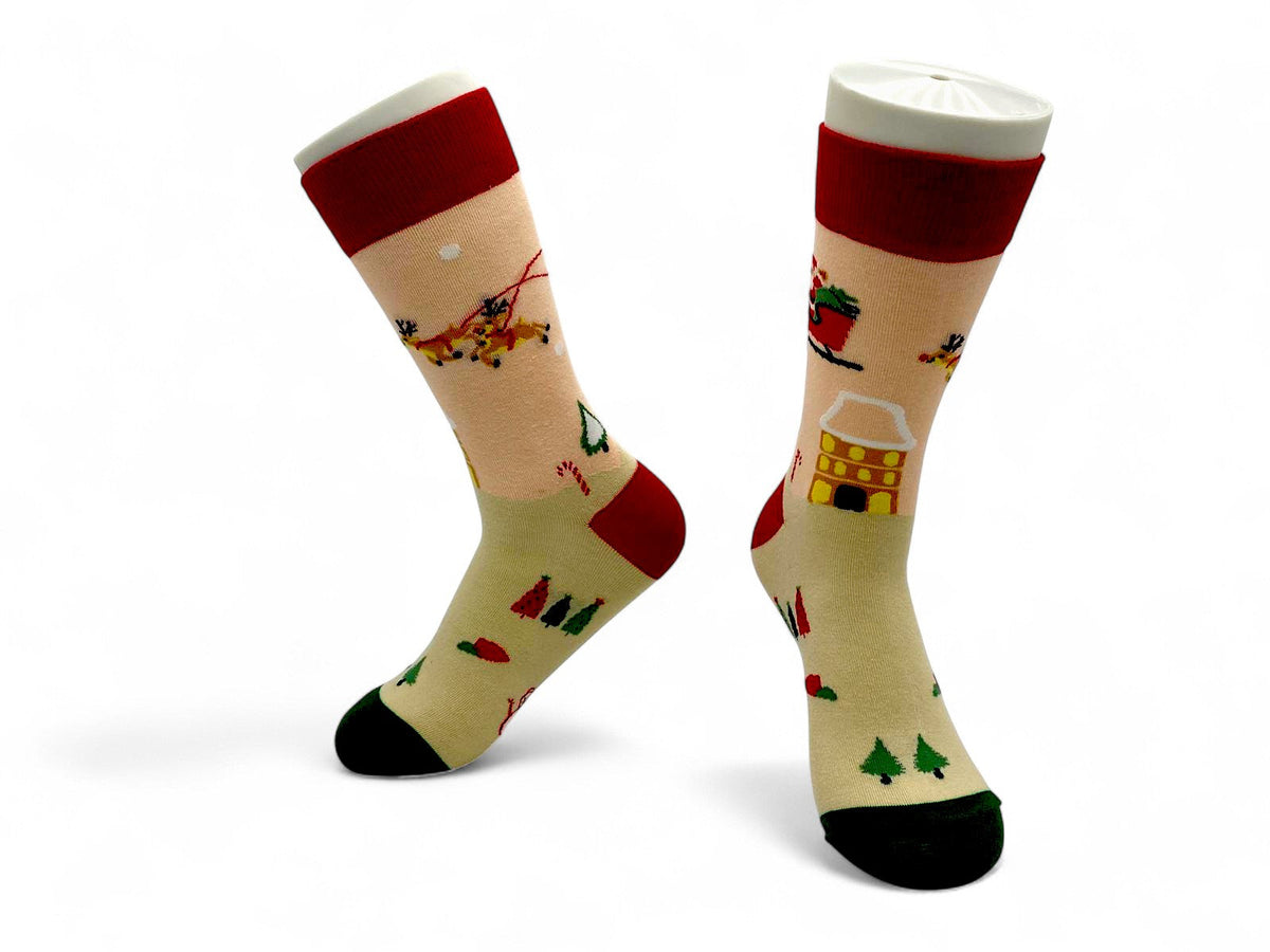 Peach Christmas crew socks with Santa in a sleigh, reindeer and a snowy yellow house
