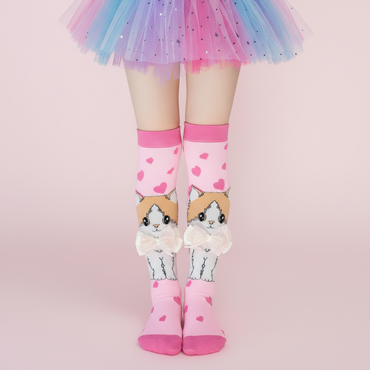 Standing girl wearing pink cat bow knee-high socks studio quality